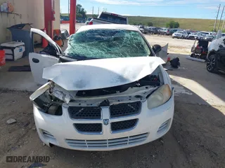 2004 Dodge Stratus SE with VIN 1B3EL36X34N138466, listed as a IAAI auction lot 41644466 with 138,916 mi miles. Bid and sale history available at carsss.com. Image 12.