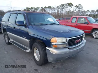 2001 GMC Yukon SLT with VIN 1GKEC13T11J123668, listed as a IAAI auction lot 41414035 with 287,516 mi miles. Bid and sale history available at carsss.com. Image 1.
