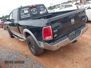 2014 Ram 1500 Laramie с VIN 1C6RR7VT2ES127196, выставлен на аукционе IAAI как лот 39957520 с пробегом 176 753 миль миль и . История ставок и продаж доступна на DreamBid. Изображение 3.
