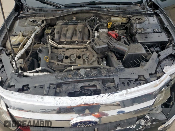 2012 Ford Fusion SEL z VIN 3FAHP0JGXCR426220, wystawiony jako Copart lot #59346985 z przebiegiem 151 397 mil mil oraz Szkoda całkowita • Salvage title. Historia ofert i sprzedaży dostępna na DreamBid. Obrazek 11.
