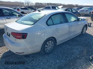 2016 Volkswagen Jetta Sedan 1.4T S w/Technology with VIN 3VW267AJ5GM249423, listed as a IAAI auction lot 41867790 with 61,979 mi miles. Bid and sale history available at carsss.com. Image 4.
