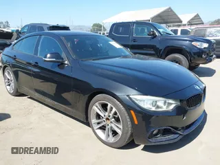 2015 BMW 4 Series 428i z VIN WBA4A9C56FGL85264, wystawiony jako IAAI lot #42397966 z przebiegiem 87 559 mil mil oraz . Historia ofert i sprzedaży dostępna na DreamBid. Obrazek 1.