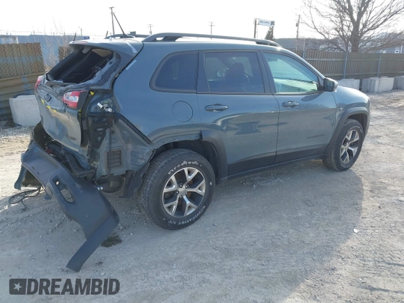 2014 Jeep Cherokee Trailhawk z VIN 1C4PJMBS5EW147579, wystawiony jako IAAI lot #41781543 z przebiegiem 155 751 mil mil oraz . Historia ofert i sprzedaży dostępna na DreamBid. Obrazek 4.