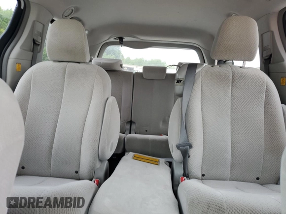 2012 Toyota Sienna LE AAS with VIN 5TDKK3DC8CS265274, listed as a Copart auction lot 54058245 with 175,063 mi miles and Salvage title. Bid and sale history available at DreamBid. Image 10.