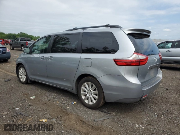 2015 Toyota Sienna LE with VIN 5TDJK3DC5FS120127, listed as a Copart auction lot 60461345 with 152,368 mi miles and Salvage title. Bid and sale history available at DreamBid. Image 2.