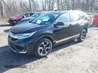 2019 Honda CR-V Touring with VIN 2HKRW2H95KH631787, listed as a IAAI auction lot 41844394 with 262,398 mi miles. Bid and sale history available at carsss.com. Image 17.