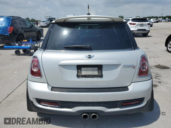 2011 MINI Hardtop S with VIN WMWSV3C53BTY25192, listed as a Copart auction lot 59100785 with Not provided miles and Salvage title. Bid and sale history available at DreamBid. Image 6.