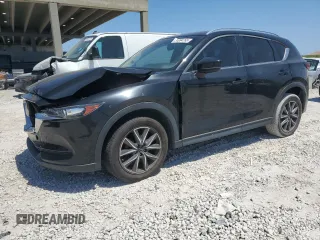 2018 Mazda CX-5 Touring with VIN JM3KFACM2J1327725, listed as a Copart auction lot 54894765 with 56,194 mi miles and Salvage Title. Bid and sale history available at carsss.com. Image 1.