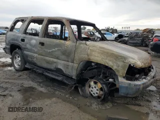 2003 Chevrolet Tahoe LS z VIN 1GNEC13T23J285248, wystawiony jako Copart lot #82634824 z przebiegiem Nie podano mil oraz Nie do naprawy • Non repairable. Historia ofert i sprzedaży dostępna na DreamBid. Obrazek 4.