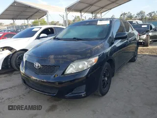 2009 Toyota Corolla with VIN 1NXBU40E19Z128054, listed as a IAAI auction lot 42085620 with 109,702 mi miles. Bid and sale history available at carsss.com. Image 2.