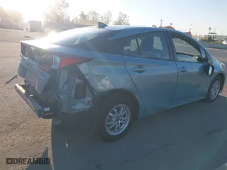 2019 Toyota Prius L Eco with VIN JTDKARFU3K3084191, listed as a IAAI auction lot 41732381 with 179,430 mi miles. Bid and sale history available at carsss.com. Image 4.