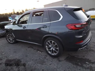 2021 BMW X5 sDrive40i with VIN 5UXCR4C03M9E13698, listed as a Copart auction lot 84158714 with 0 mi miles and Salvage Title. Bid and sale history available at carsss.com. Image 2.