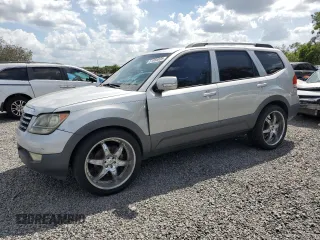 2009 Kia Borrego LX with VIN KNDJJ741395030543, listed as a Copart auction lot 51056035 with 165,448 mi miles and Salvage Title. Bid and sale history available at carsss.com. Image 1.