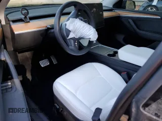 2024 Tesla Model Y Long Range с VIN 7SAYGDEE9RA230998, выставлен на аукционе Copart как лот 51682025 с пробегом Не указан миль и Списание • Salvage title. История ставок и продаж доступна на DreamBid. Изображение 8.