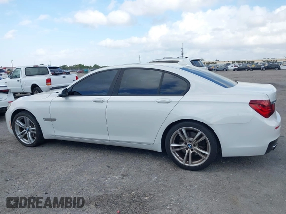 2014 BMW 7 Series 740i with VIN WBAYA6C53ED144195, listed as a IAAI auction lot 41720500 with 123,776 mi miles and . Bid and sale history available at DreamBid. Image 14.
