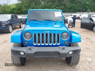 2016 Jeep Wrangler Unlimited 75th Anniversary with VIN 1C4HJWEG0GL154418, listed as a IAAI auction lot 42192717 with 102,514 mi miles and . Bid and sale history available at DreamBid. Image 6.