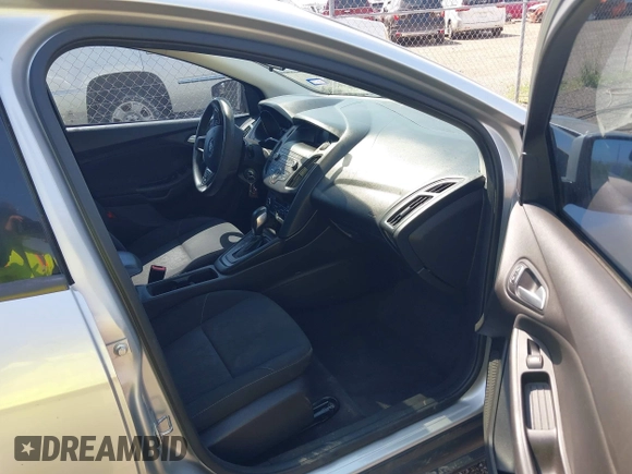 2018 Ford Focus SE z VIN 1FADP3FE0JL321530, wystawiony jako IAAI lot #42275532 z przebiegiem 65 412 mil mil oraz . Historia ofert i sprzedaży dostępna na DreamBid. Obrazek 5.