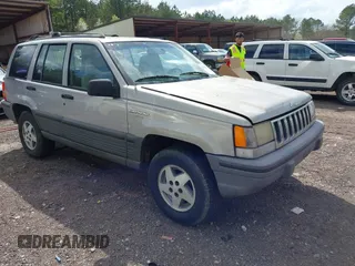 1994 Jeep Grand Cherokee Laredo with VIN 1J4GZ58Y0RC200247, listed as a IAAI auction lot 41781078 with 217,698 mi miles. Bid and sale history available at carsss.com. Image 1.