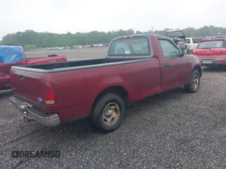 1997 Ford F-150 with VIN 1FTDF176XVNB00018, listed as a IAAI auction lot 42467851 with 217,082 mi miles and . Bid and sale history available at DreamBid. Image 4.