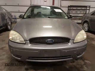 2006 Ford Taurus SE with VIN 1FAFP53U86A113947, listed as a IAAI auction lot 41753927 with 203,867 mi miles. Bid and sale history available at carsss.com. Image 12.