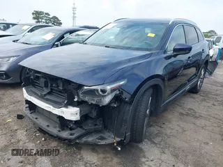 2021 Mazda CX-9 Carbon Edition with VIN JM3TCADY1M0516505, listed as a IAAI auction lot 42016644 with 50,900 mi miles and . Bid and sale history available at carsss.com. Image 18.