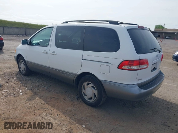 2002 Toyota Sienna LE with VIN 4T3ZF13CX2U506371, listed as a IAAI auction lot 42058440 with 215,434 mi miles. Bid and sale history available at carsss.com. Image 3.