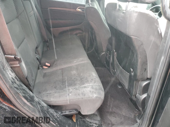 2018 Jeep Grand Cherokee Laredo E with VIN 1C4RJFAG5JC113283, listed as a Copart auction lot 57569595 with 90,897 mi miles and Salvage title. Bid and sale history available at DreamBid. Image 11.
