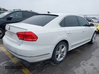 2014 Volkswagen Passat TDI SEL Premium with VIN 1VWCN7A32EC035738, listed as a IAAI auction lot 41641843 with 151,159 mi miles. Bid and sale history available at carsss.com. Image 4.