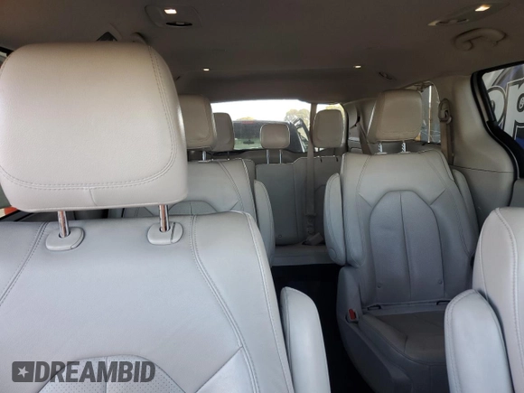2021 Chrysler Pacifica Hybrid Touring L with VIN 2C4RC1L7XMR593911, listed as a Copart auction lot 57842415 with 74,910 mi miles and Salvage title. Bid and sale history available at DreamBid. Image 10.