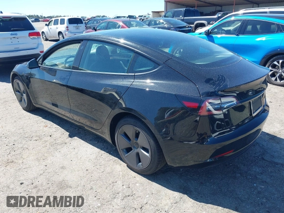 2022 Tesla Model 3 Long Range with VIN 5YJ3E1EB3NF104313, listed as a IAAI auction lot 41832803 with 39,061 mi miles and . Bid and sale history available at DreamBid. Image 3.