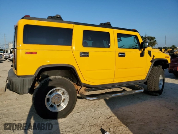 2003 Hummer H2 with VIN 5GRGN23U23H145779, listed as a Copart auction lot 72048564 with 268,329 mi miles and Clean Title. Bid and sale history available at carsss.com. Image 3.