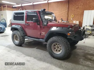 2007 Jeep Wrangler Sahara z VIN 1J4FA54127L132543, wystawiony jako Copart lot #55891995 z przebiegiem 74 616 mil mil oraz Szkoda całkowita • Salvage title. Historia ofert i sprzedaży dostępna na DreamBid. Obrazek 4.