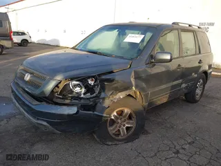 2005 Honda Pilot EX with VIN 2HKYF18455H565742, listed as a IAAI auction lot 41264177 with 304,396 mi miles. Bid and sale history available at carsss.com. Image 17.