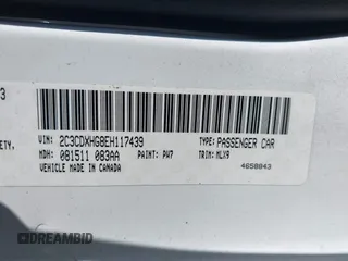 2014 Dodge Charger SXT with VIN 2C3CDXHG8EH117439, listed as a IAAI auction lot 41458304 with 189,041 mi miles and . Bid and sale history available at DreamBid. Image 9.
