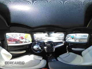 2023 MINI Hardtop Cooper SE with VIN WMW13DJ07P2S73739, listed as a IAAI auction lot 42542088 with 16,344 mi miles and . Bid and sale history available at DreamBid. Image 21.