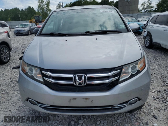 2015 Honda Odyssey Touring Elite z VIN 5FNRL5H93FB041067, wystawiony jako Copart lot #58329355 z przebiegiem 72 000 mil mil oraz Szkoda całkowita • Salvage title. Historia ofert i sprzedaży dostępna na DreamBid. Obrazek 5.