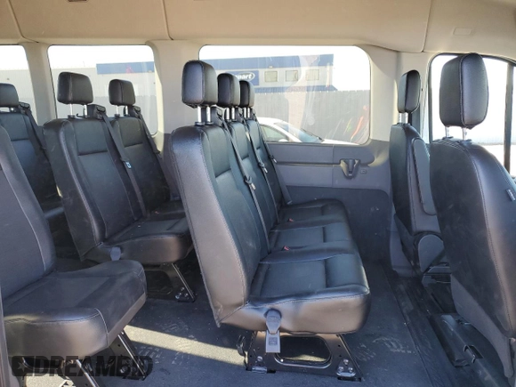2023 Ford Transit Passenger XL with VIN 1FBAX9C85PKC11039, listed as a Copart auction lot 88472055 with 8,569 mi miles and Salvage Title. Bid and sale history available at DreamBid. Image 11.