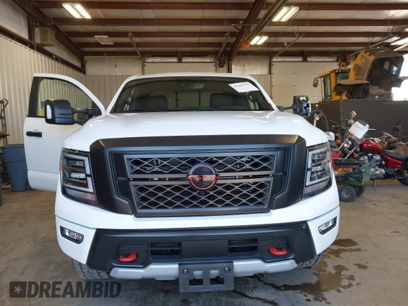 2024 Nissan Titan Pro-4X with VIN 1N6AA1ED0RN112314, listed as a IAAI auction lot 42465520 with 8,711 mi miles and . Bid and sale history available at DreamBid. Image 13.