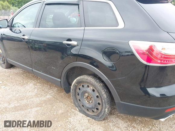 2012 Mazda CX-9 Grand Touring с VIN JM3TB3DA2C0354299, выставлен на аукционе IAAI как лот 42772886 с пробегом 139 570 миль миль и . История ставок и продаж доступна на DreamBid. Изображение 6.