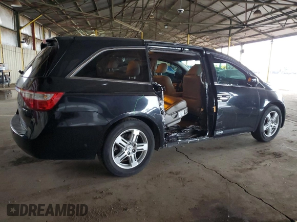 2012 Honda Odyssey Touring with VIN 5FNRL5H94CB026539, listed as a Copart auction lot 48925605 with 88,381 mi miles and Salvage Title. Bid and sale history available at DreamBid. Image 3.