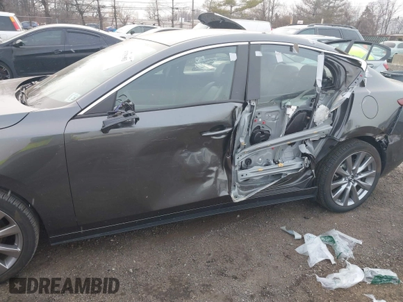 2023 Mazda 3 S Select with VIN 3MZBPABM2PM354066, listed as a IAAI auction lot 41339983 with 13,536 mi miles and . Bid and sale history available at DreamBid. Image 6.