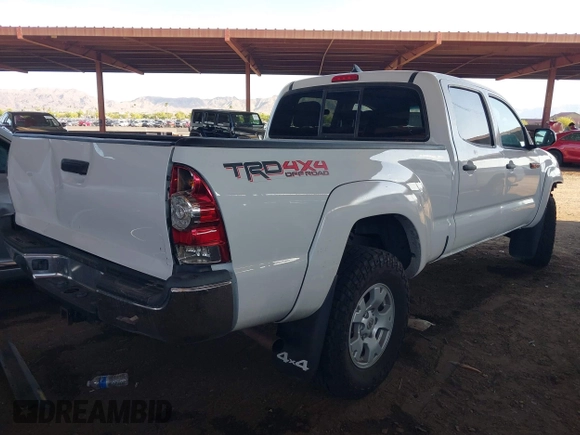 2015 Toyota Tacoma with VIN 3TMMU4FN0FM084956, listed as a IAAI auction lot 42184249 with 116,576 mi miles and . Bid and sale history available at DreamBid. Image 4.