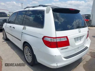 2007 Honda Odyssey LX with VIN 5FNRL382X7B135892, listed as a IAAI auction lot 42223231 with 204,054 mi miles and . Bid and sale history available at DreamBid. Image 3.