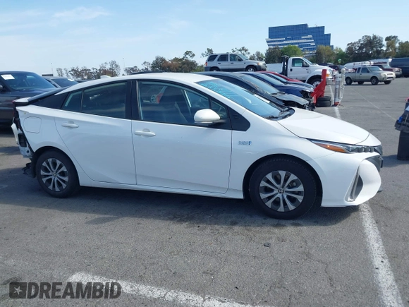 2021 Toyota Prius LE with VIN JTDKAMFP7M3197111, listed as a IAAI auction lot 42031569 with 240,098 mi miles and . Bid and sale history available at DreamBid. Image 14.