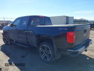 2016 Chevrolet Silverado 1500 LT with VIN 1GCVKREC3GZ121358, listed as a IAAI auction lot 41693996 with 103,811 mi miles and . Bid and sale history available at DreamBid. Image 3.