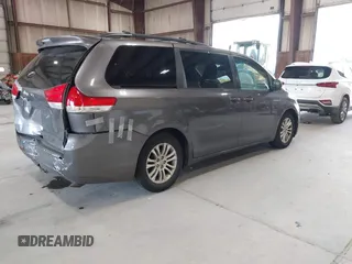 2011 Toyota Sienna XLE AAS z VIN 5TDYK3DC9BS086170, wystawiony jako IAAI lot #42596944 z przebiegiem 156 813 mil mil oraz . Historia ofert i sprzedaży dostępna na DreamBid. Obrazek 4.