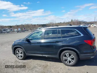 2016 Honda Pilot EX-L with VIN 5FNYF5H57GB023852, listed as a IAAI auction lot 41811412 with 151,707 mi miles and . Bid and sale history available at DreamBid. Image 14.