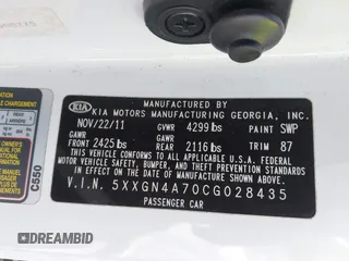 2012 Kia Optima EX with VIN 5XXGN4A70CG028435, listed as a IAAI auction lot 41640394 with 153,000 mi miles. Bid and sale history available at carsss.com. Image 9.