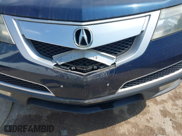 2012 Acura MDX with VIN 2HNYD2H2XCH539597, listed as a IAAI auction lot 42500935 with 132,272 mi miles and . Bid and sale history available at DreamBid. Image 6.