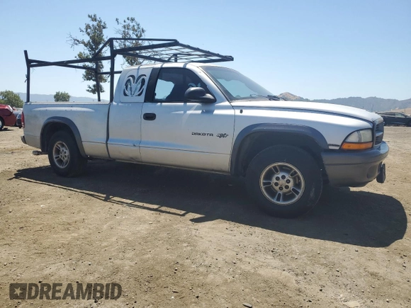 2002 Dodge Dakota with VIN 1B7GL12X32S557546, listed as a Copart auction lot 66879734 with 218,981 mi miles and Salvage Title. Bid and sale history available at carsss.com. Image 4.